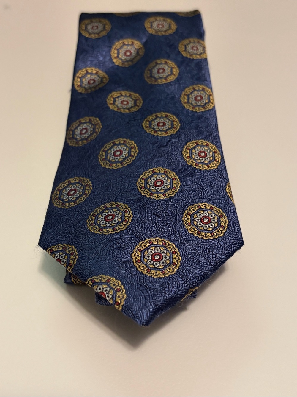 Jos. A. Bank Blue Medallion Silk Tie with Gold and Red Accents